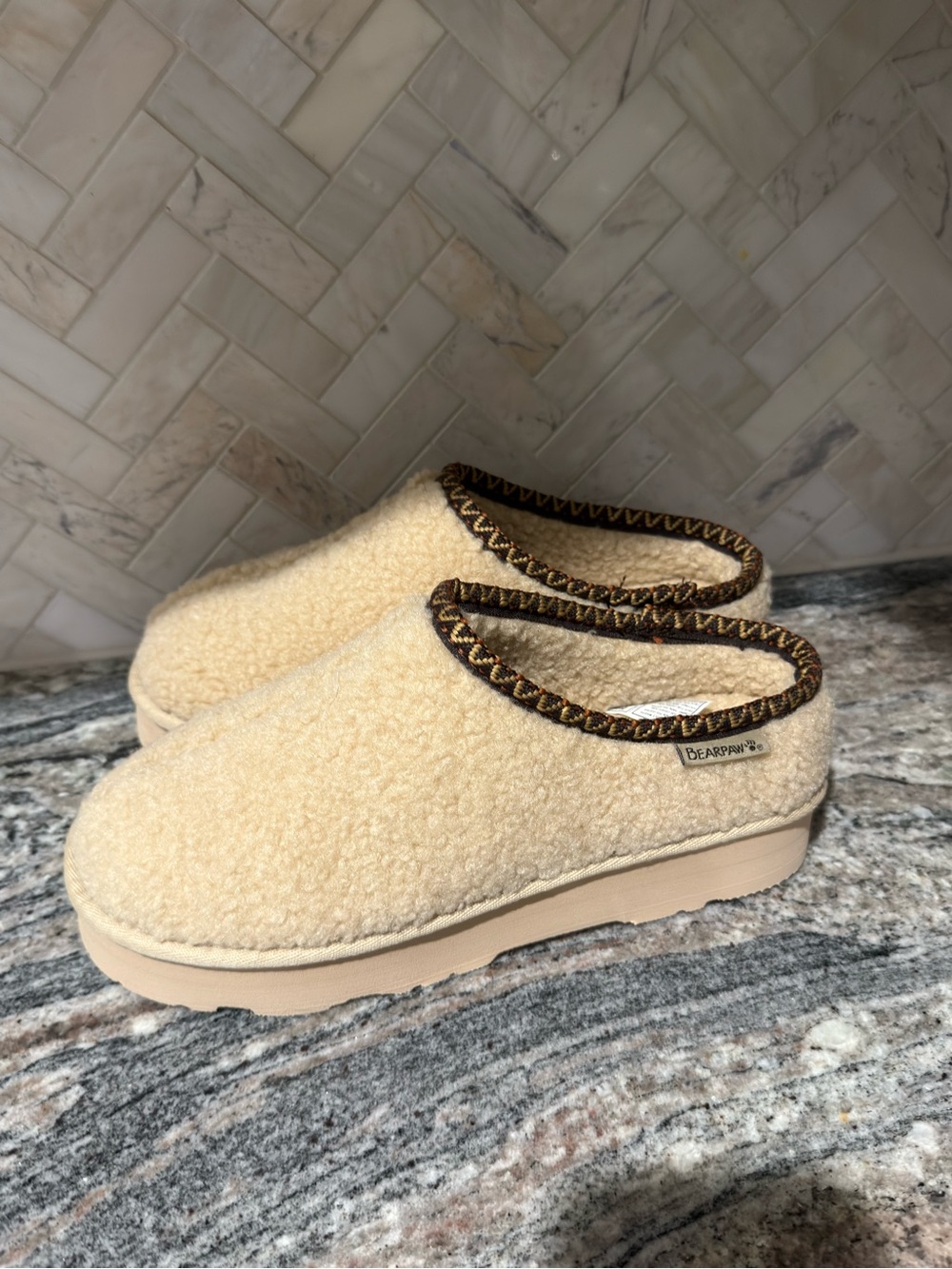 BearPaw Women's Cream Sherpa Slip-On Clogs with Brown Trim
